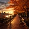 Golden sunset over city highlights vibrant fall foliage and tranquility