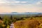 Golden sunset over vineyards with the Badacsony mountain and the Lake Balaton