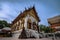 A golden tall Buddha standing at wat Intharawihan.