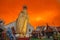 A golden tall Buddha standing at wat Intharawihan.