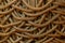 Golden tangled ropes texture background.