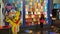 Golden teddy bear display wall of Haribo candies of various flavors for sale by weight in multiplex cinema