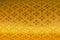 Golden textile pattern background.