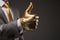 Golden Thumbs Up: A Political Imagery In Organic Sculpting Style