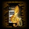 Golden treble clef saxophone piano key on a brick wall