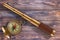 Golden Vintage Telescope Spyglass with Compass over Wooden Table