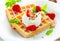 Golden waffle with strawberries and cream