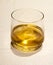 golden whiskey glass. Whisky on the rocks