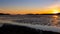 Golden winter sunset over Kirkcudbright Bay mudflats and the Dee estuary