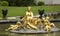 Golden Woman and children statue at Linderhof Palace garden in Bavaria, Germany