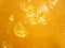 Golden yellow bubble oil droplet