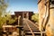 Goldfield Gold Mine`s old dangerous entrance to a gold mine shaft with trolley and rails leading inside