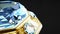 Goldish ring with blue topaz or diamond gem, isolated, fictive design - object 3D illustration