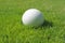 Golf ball on green grass. Neural network AI generated