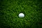 Golf ball on green grass. Neural network AI generated