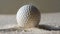 Golf ball hitting the sand in a bunker, with grains of sand flying around, captured in a close-up shot