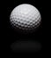 Golf ball in spot on black