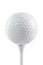 Golf ball on a stand isolated