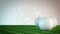 Golf balls on grass field with bokeh background - seamless loop