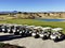 Golf buggies lined up in front of the course in Hacienda del Alamo, Murcia, Spain