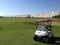 Golf buggy parked on the golf course at Condado de Alhama Golf cource in Costa Calida south Spain