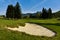 Golf bunker or sand trap in fairway