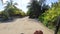 Golf cart buggy ride with feet up Holbox island Mexico