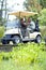 Golf cart, old couple or happy golfers driving on course in fitness workout or exercise while talking together. Mature