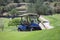 Golf cart parked on a golf course