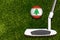 A golf club and a ball with flag Lebanon during a golf game