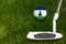 A golf club and a ball with flag Lesotho during a golf game