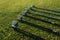 Golf clubs arranged on the green grassy field