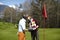 Golf couple kissing on a golf course