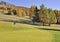 Golf-course in alpine mountain in autumn