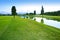 Golf course green grass field lake reflection