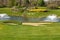 Golf course with water fountains