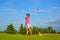 Golf, girl golfer is going to punch the ball