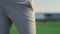 Golf player hands swing hold putter club on green course. Man play sport outside