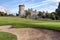 Golf sand bunker by golf green and castle