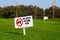 Golf signs on grass