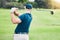 Golf stroke, sport swing and golfer outdoor for game, fitness and exercise on grass. Athlete back, training and man at a