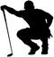 Golfer crouching on the golf course analyzing, planning the golf tee shot, golf swing with a golf club in hand. Golfer in a squat