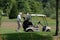 Golfer and golf cart