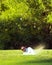 Golfer Hits Ball From Sand Trap Bunker