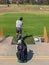 Golfer practicing at golf driving range practice facilit