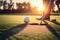 Golfer putting golf ball on the green golf, lens flare on sun set evening time. Generative AI