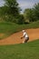 Golfer in the sand bunker.