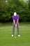 Golfer stance for a mid iron shot