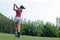 Golfer women sport course golf ball fairway. People lifestyle woman playing game golf