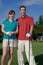 Golfers Smile at Camera - Vertictal